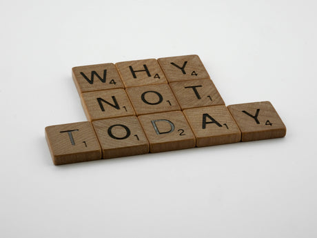 a scrabble of scrabble tiles that say why not today