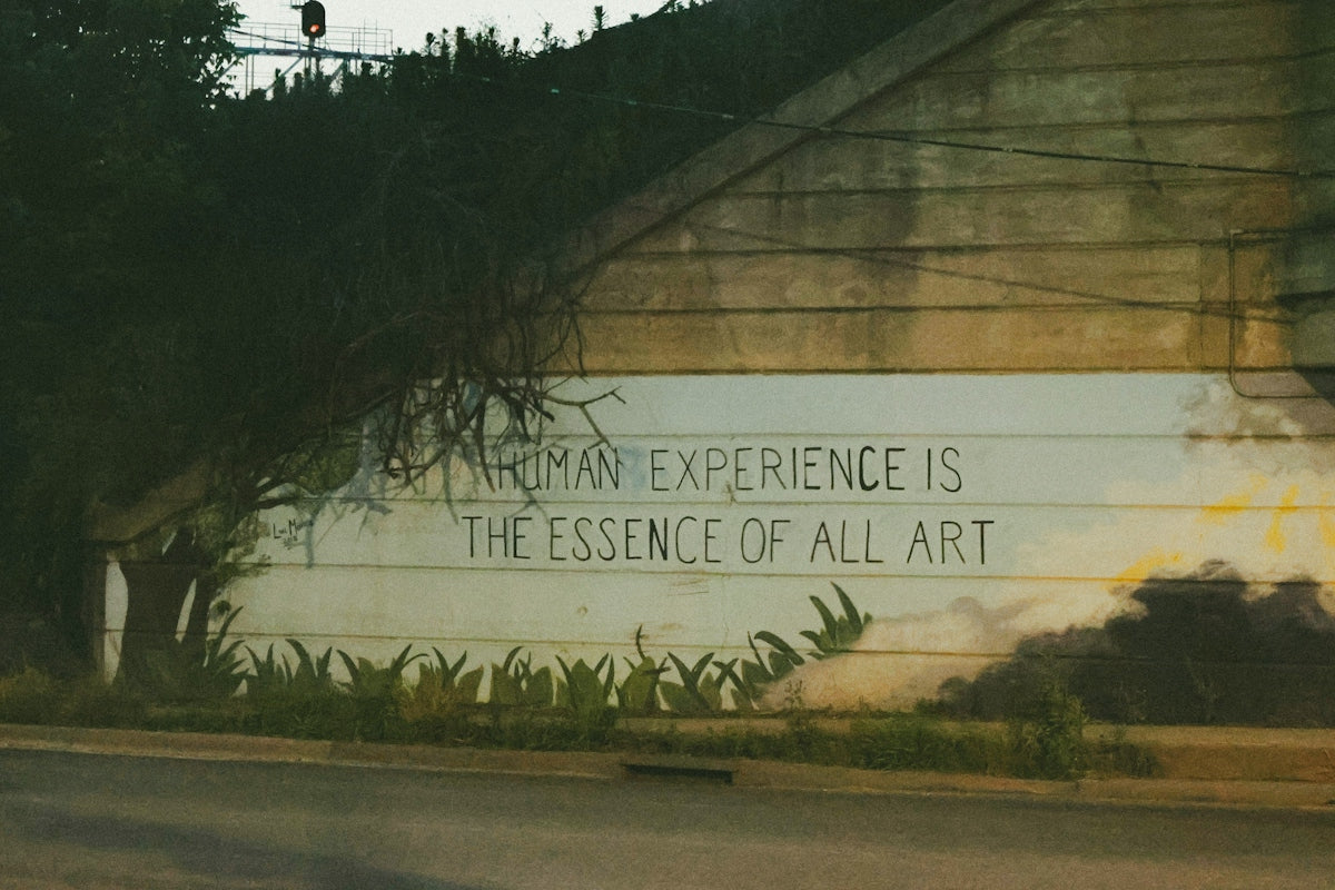 Graffiti on a wall: human experience is art.