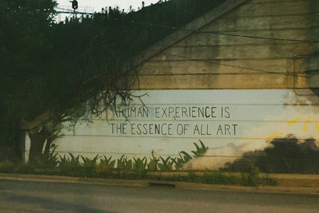 Graffiti on a wall: human experience is art.